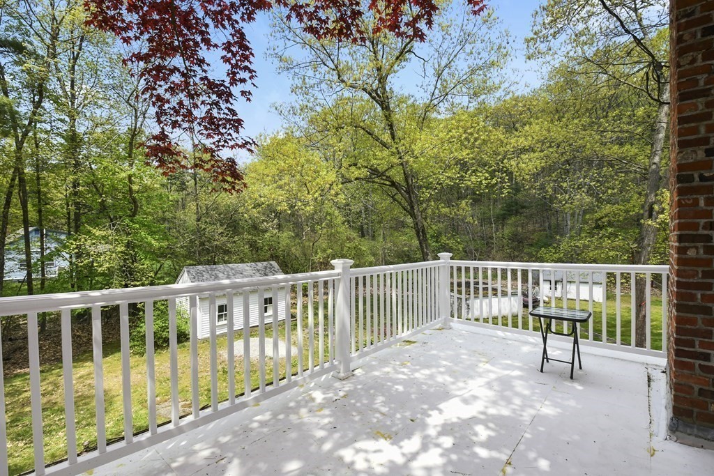 125 Lower Gore Road Webster, MA 01570 - Photo 14 of 42 a view of a two chairs and table in the balcony