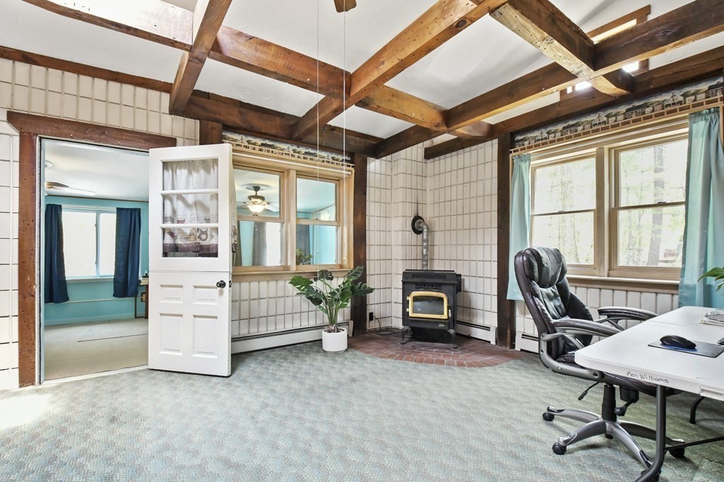 125 Lower Gore Road Webster, MA 01570 - Photo 16 of 42 a view of a workspace with furniture and a window