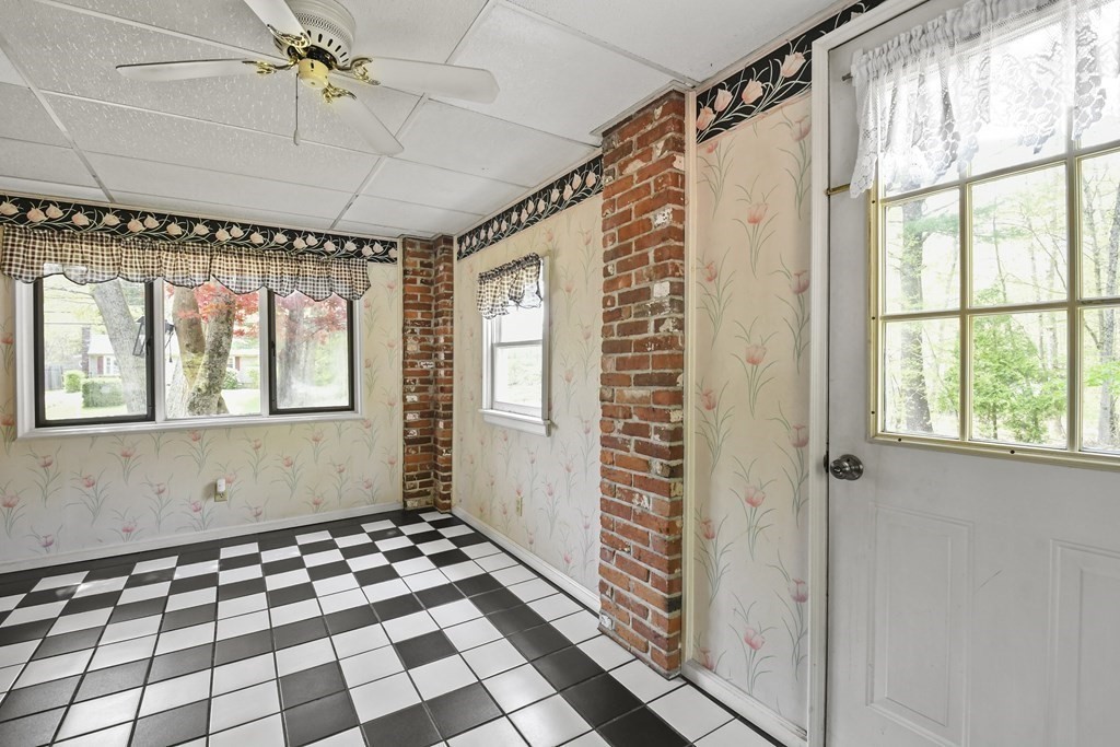 125 Lower Gore Road Webster, MA 01570 - Photo 21 of 42 a bathroom with a black and white checkered floor