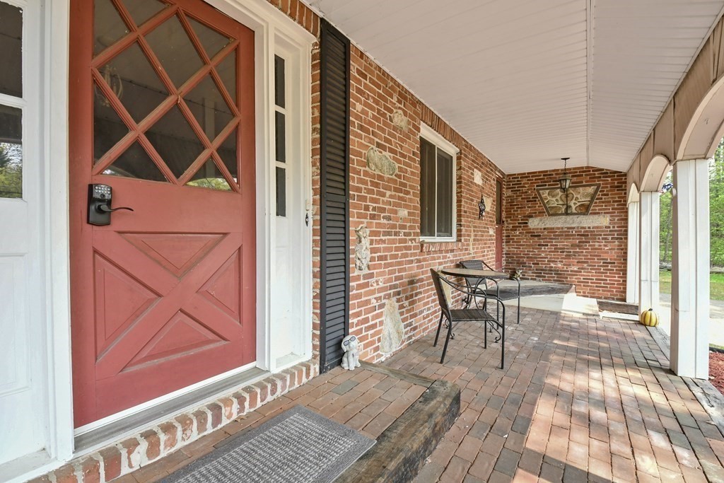 125 Lower Gore Road Webster, MA 01570 - Photo 3 of 42 a balcony view with a seating space