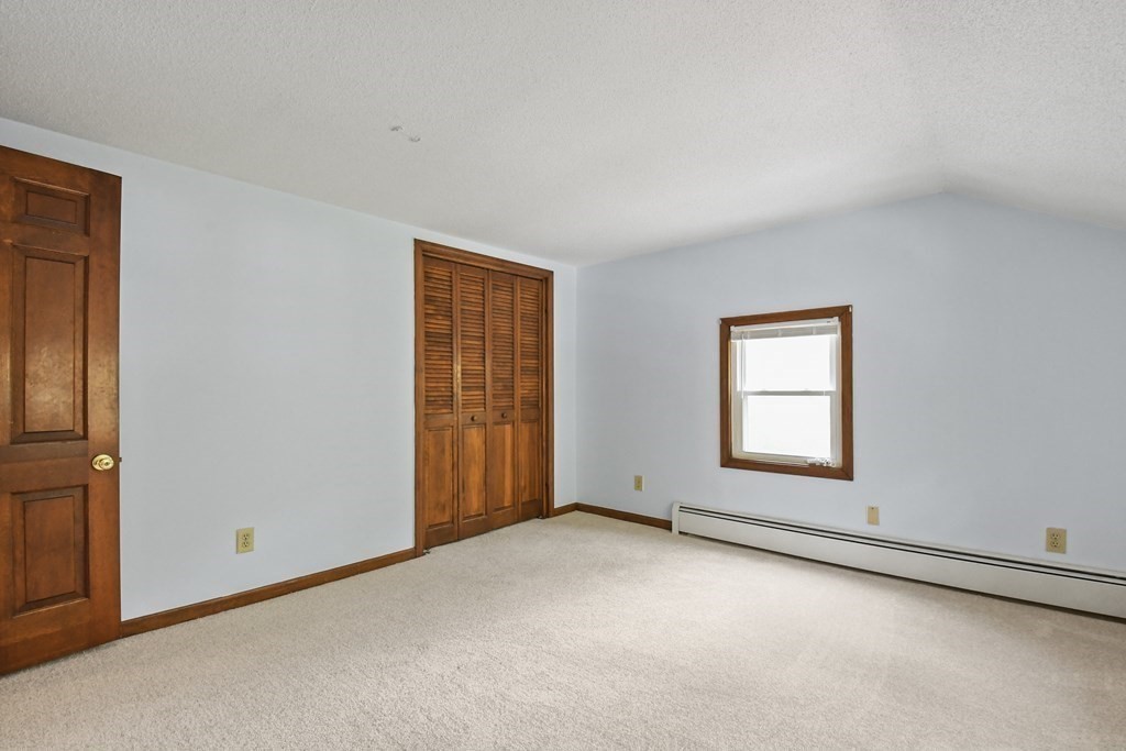 125 Lower Gore Road Webster, MA 01570 - Photo 31 of 42 an empty room with windows