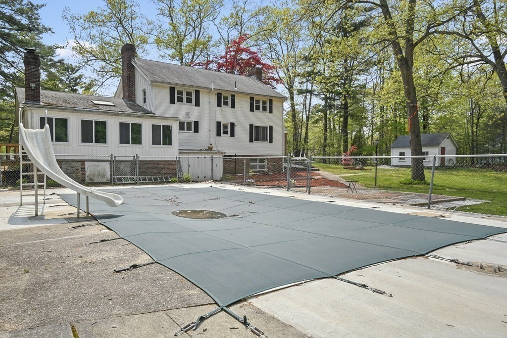 125 Lower Gore Road Webster, MA 01570 - Photo 34 of 42 a view of a white house with a yard