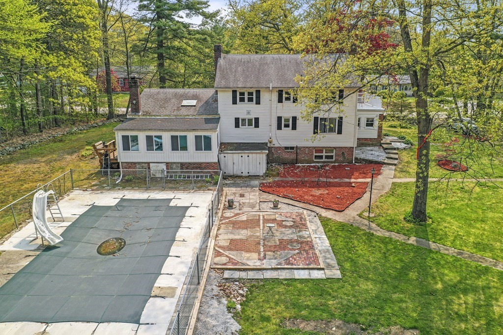 125 Lower Gore Road Webster, MA 01570 - Photo 35 of 42 aerial view of a house with swimming pool