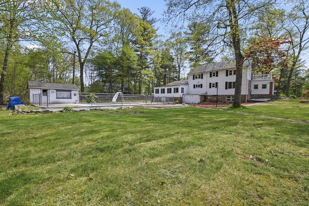 125 Lower Gore Road Webster, MA 01570 - Photo 37 of 42 a view of a house with a big yard and large trees
