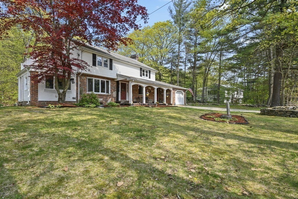 125 Lower Gore Road Webster, MA 01570 - Photo 39 of 42 a view of a house with a yard