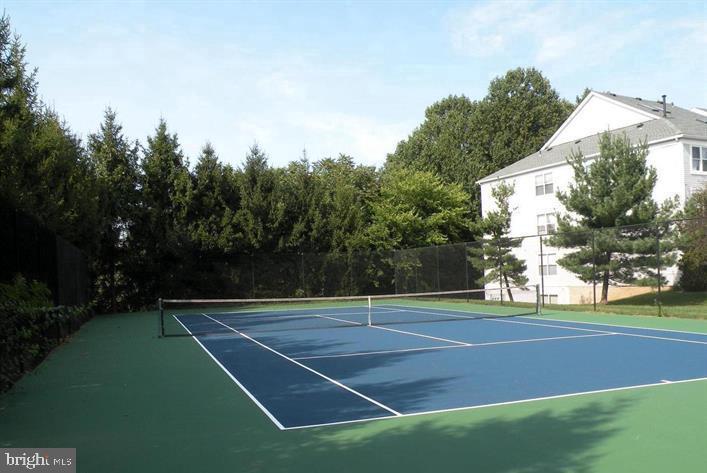10019 Vanderbilt Circle, Unit 10 Rockville, MD 20850 - Photo 17 of 22 a view of a tennis court