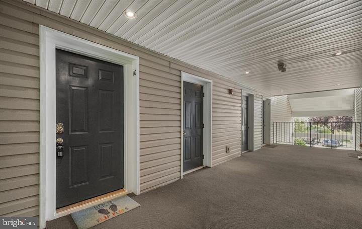 10019 Vanderbilt Circle, Unit 10 Rockville, MD 20850 - Photo 2 of 22 a view of empty room with windows