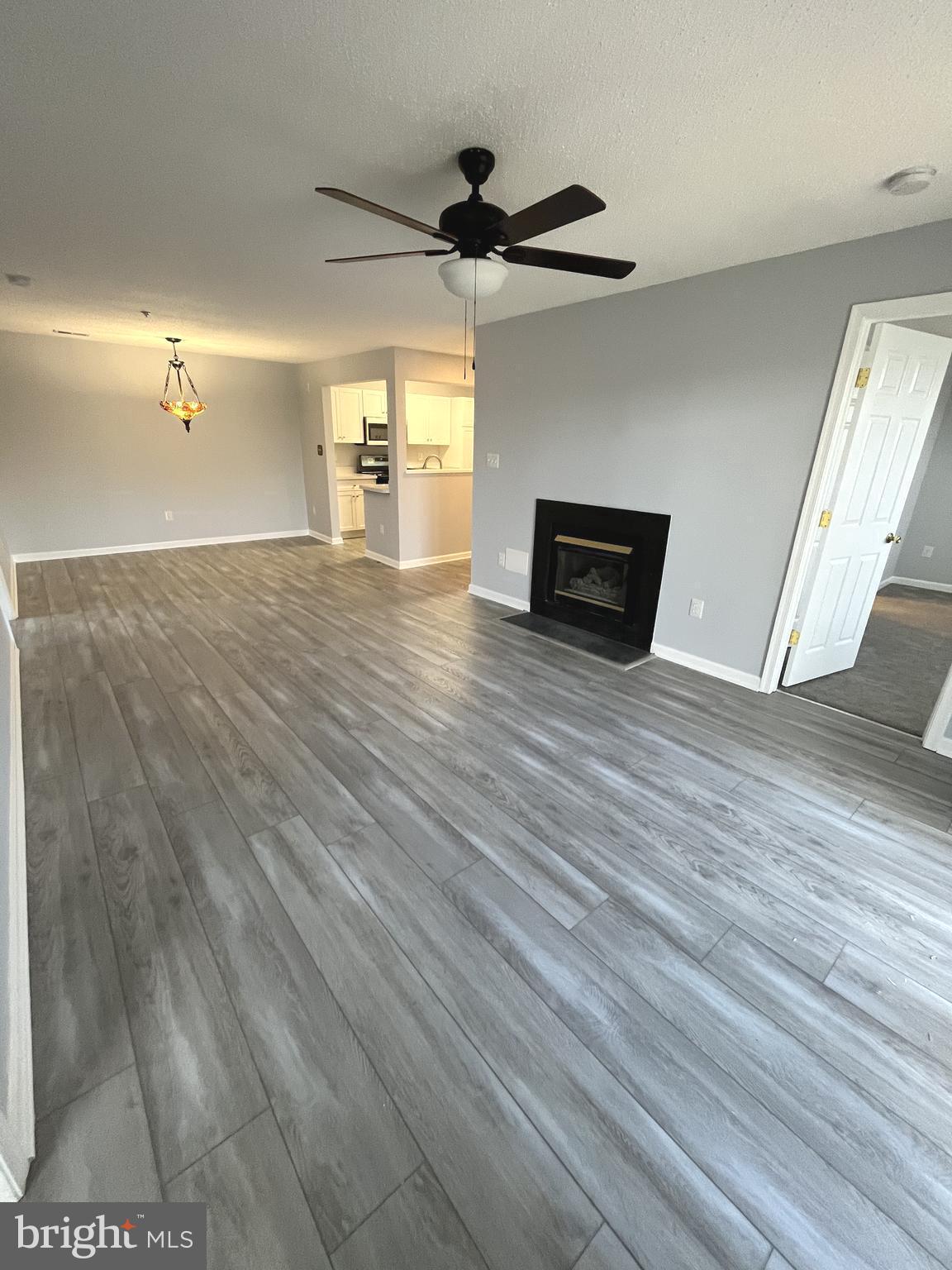 10019 Vanderbilt Circle, Unit 10 Rockville, MD 20850 - Photo 7 of 22 a view of empty room with wooden floor