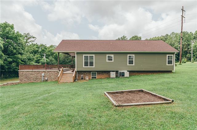 3761 Clarity Road Springfield, TN 37172 - Photo 16 of 20 Another view from the back. There is a raised garden in the yard, perfect for flowers or vegetables. This home comes with 6+ acres on a cul de sac street.