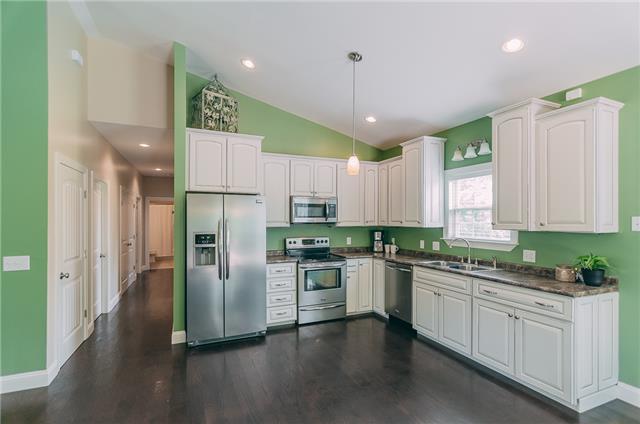3761 Clarity Road Springfield, TN 37172 - Photo 5 of 20 The kitchen is open to the living & dining area & perfect for entertaining. The middle light is a great place for an island!