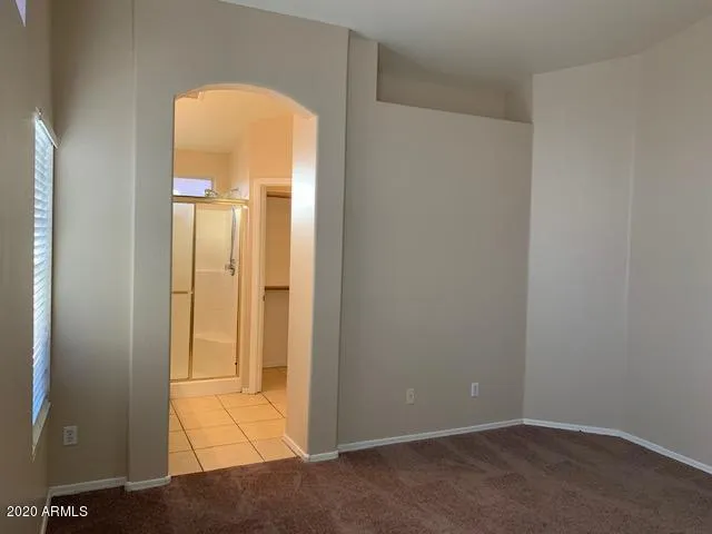 an empty room with window