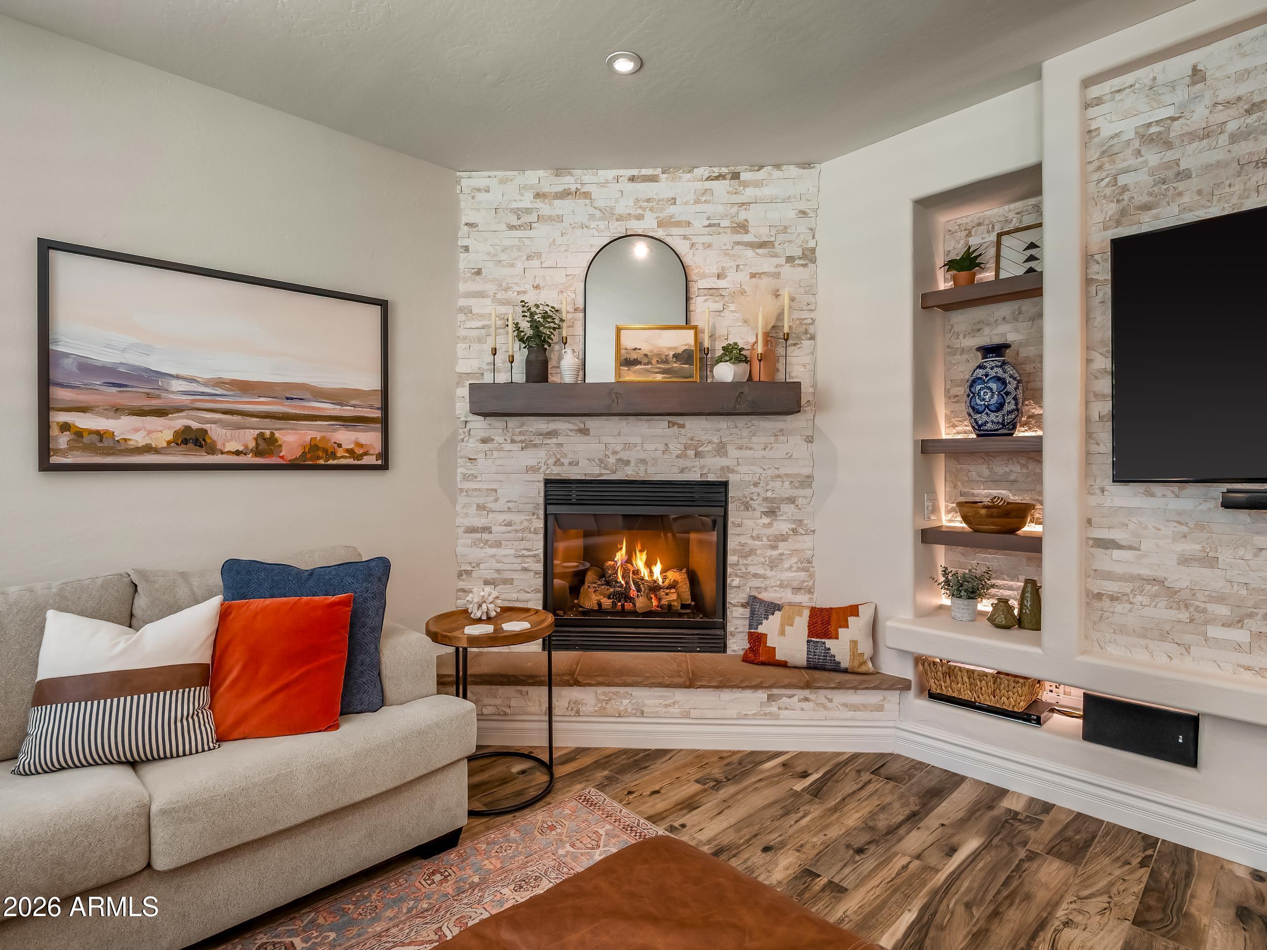 3416 West Montello Road Phoenix, AZ 85086 - Photo 25 of 68 Family room with gas fireplace