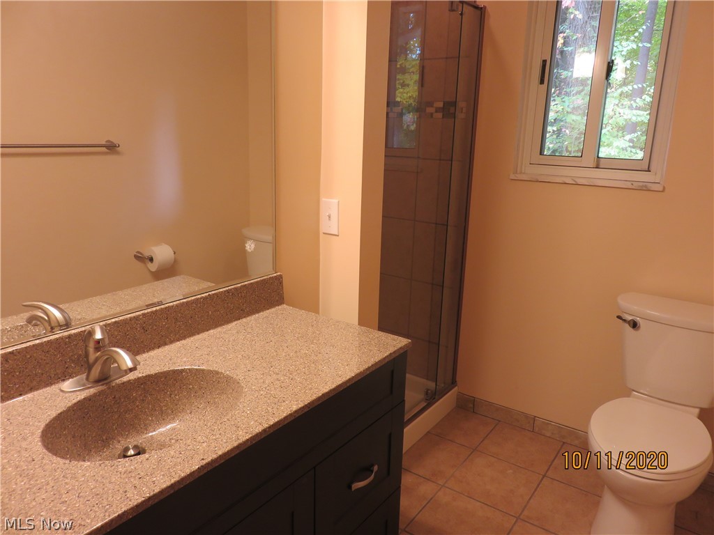1896 Killian Road Akron, OH 44312 - Photo 9 of 23 Updated Bath with quality workmanship. Tiled shower too!