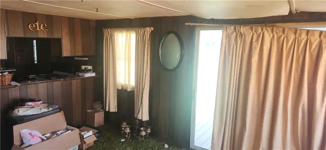 a room with furniture and a lamp