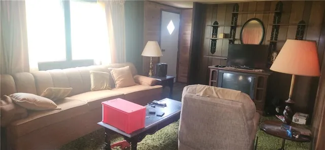 a kitchen with a stove a sink and a refrigerator