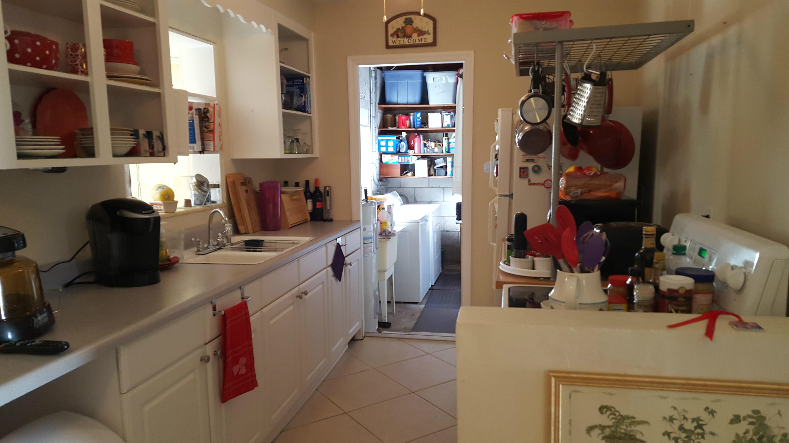 5148 Madison Road Delray Beach, FL 33484 - Photo 3 of 12 MADISON RD KITCHEN LAUNDRY