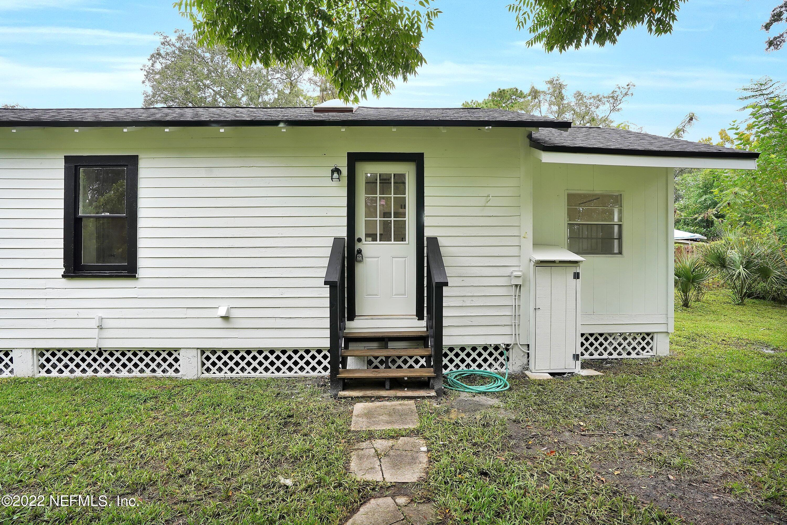 1441 Rensselaer Avenue Jacksonville, FL 32205 - Photo 30 of 35 a front view of a house with a garden