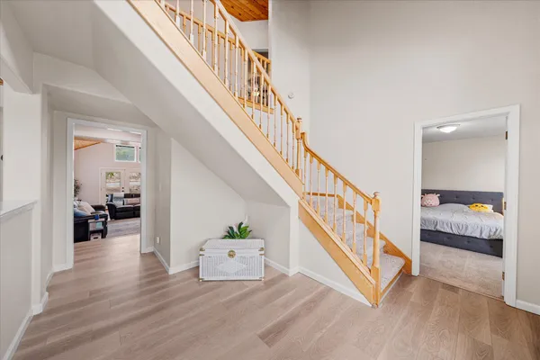 a bedroom with a bed and dresser