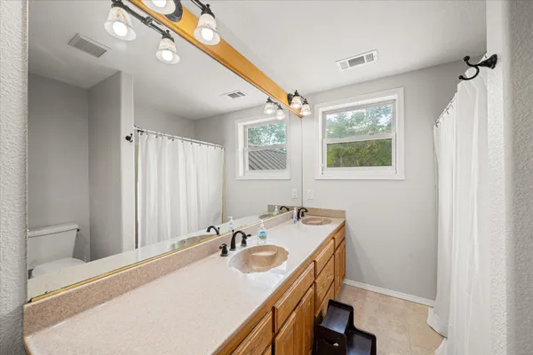 a view of a room with furniture and a yard