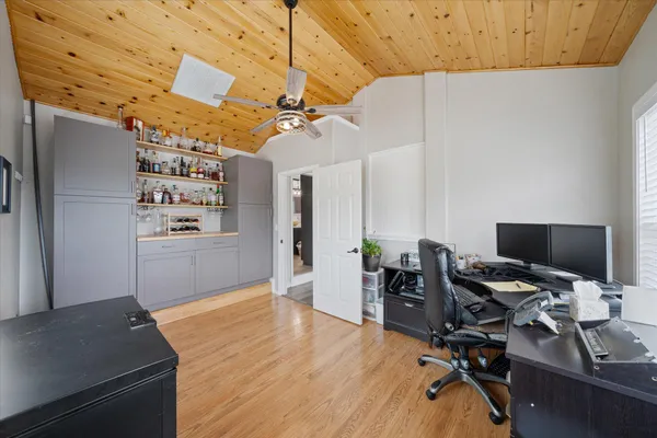 a view of a park with large trees