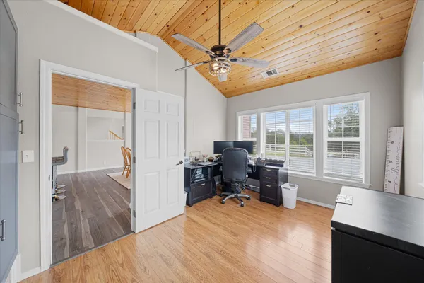 a backyard of a house with lots of green space