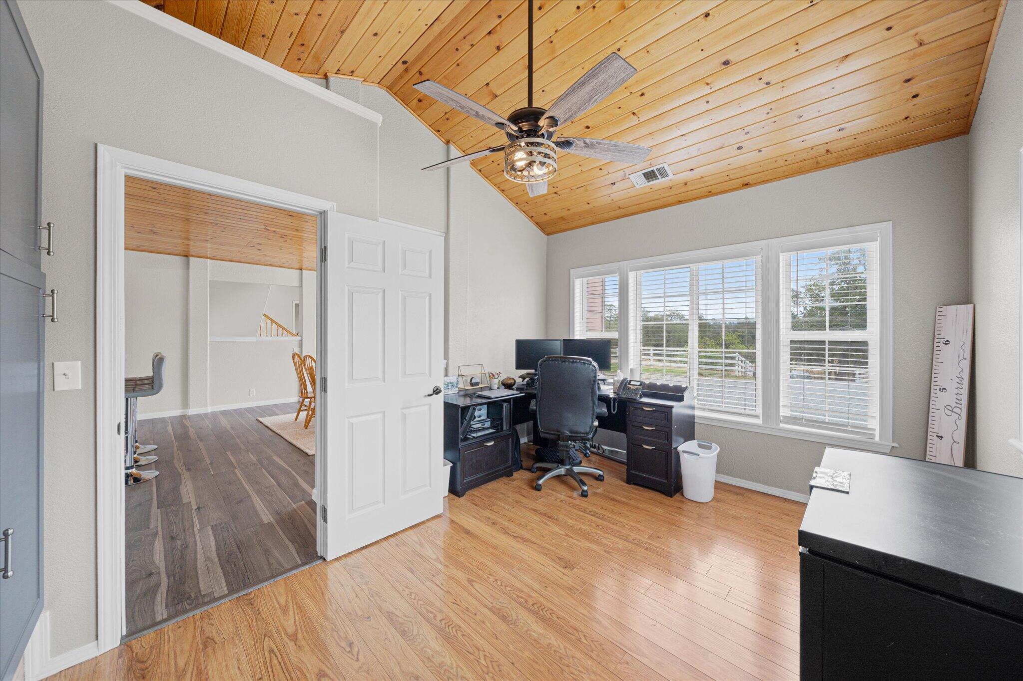 10190 Oak Run Road Oak Run, CA 96069 - Photo 37 of 81 a bedroom with furniture and a large window