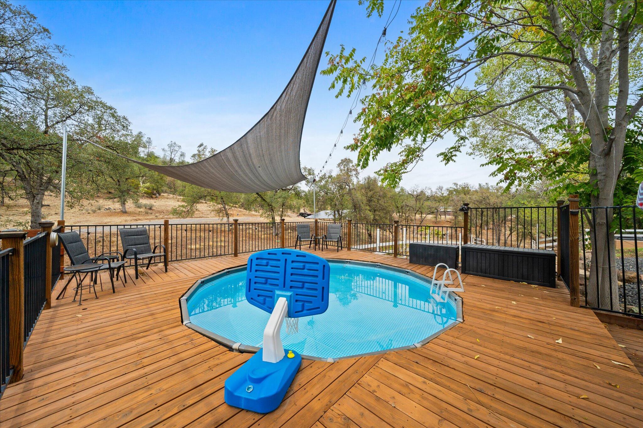 10190 Oak Run Road Oak Run, CA 96069 - Photo 61 of 81 a view of a swimming pool with sitting area