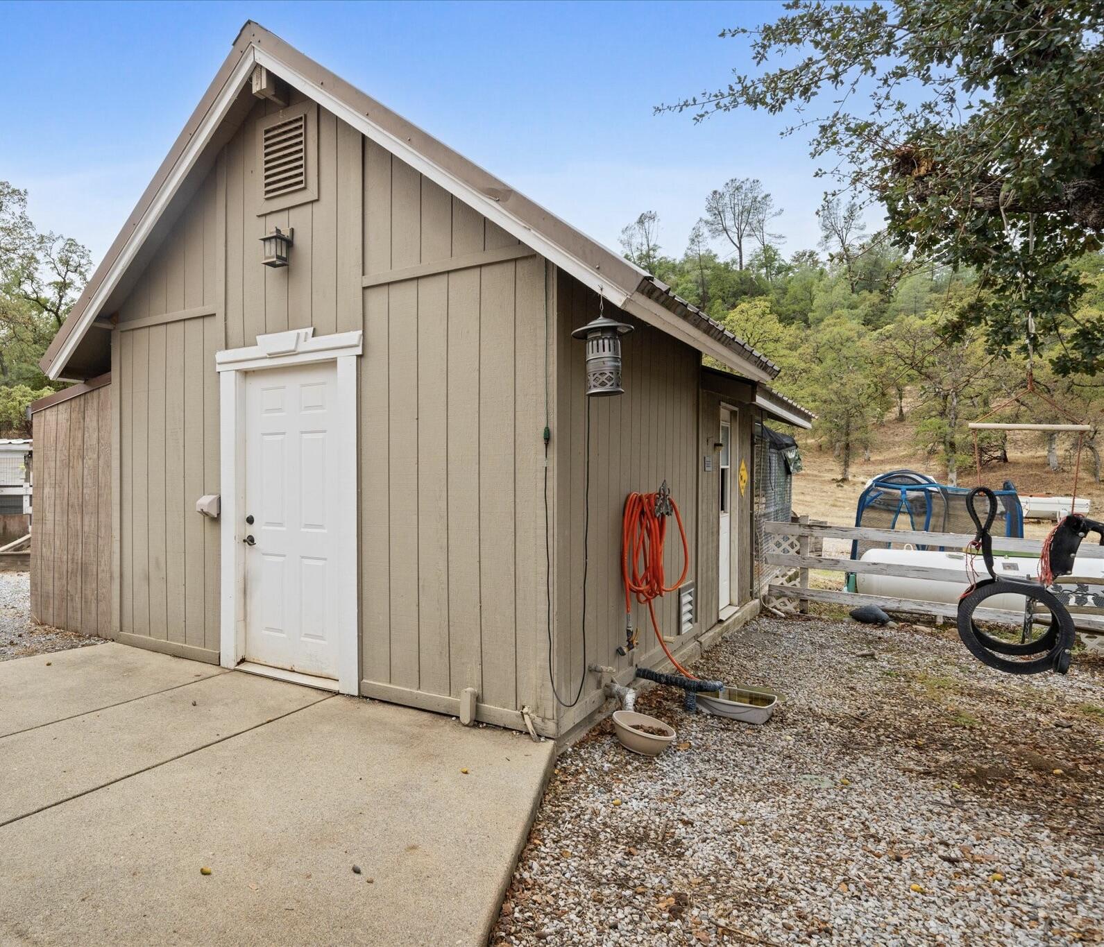10190 Oak Run Road Oak Run, CA 96069 - Photo 66 of 81 a front view of a house with parking area