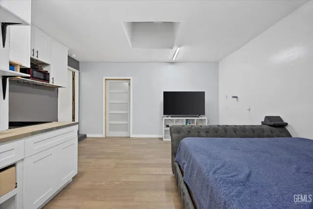 a kitchen with stainless steel appliances granite countertop a sink and a stove