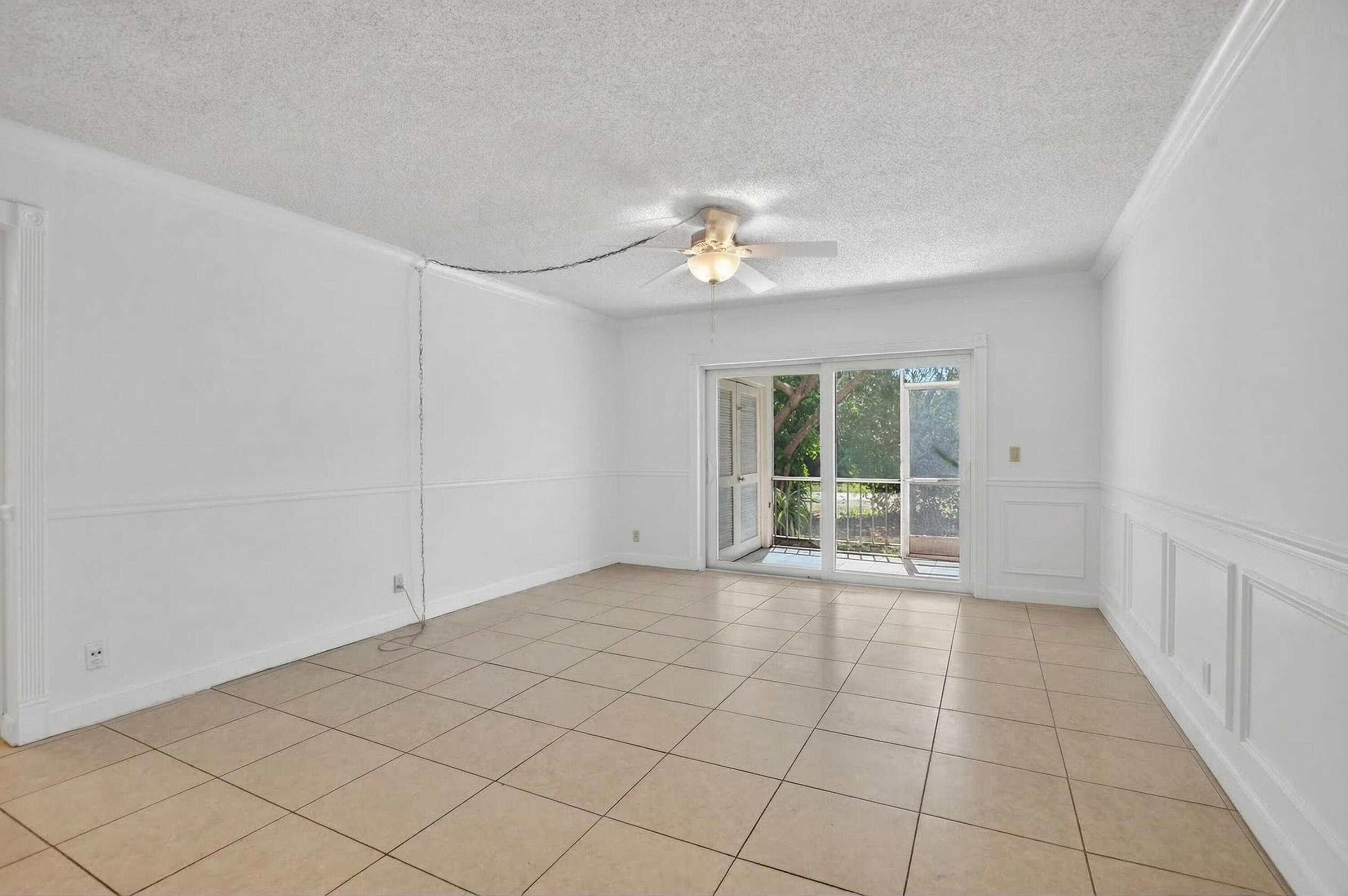 636 Northwest 13th Street, Unit 110 Boca Raton, FL 33486 - Photo 2 of 35 a view of an empty room with a window