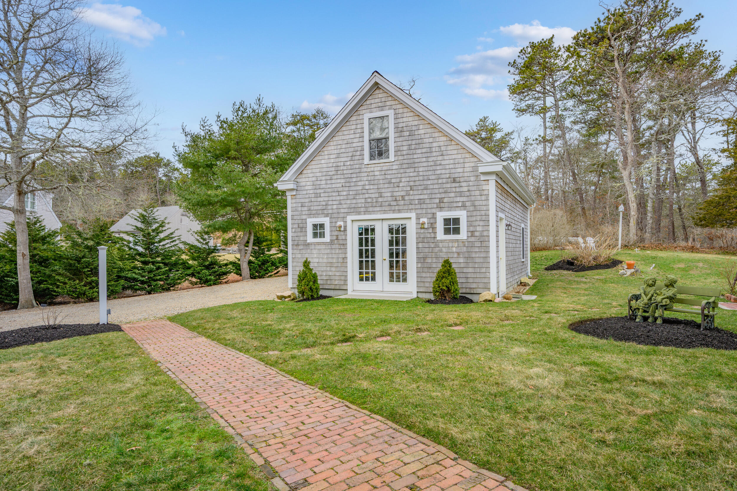 332 South Orleans Road Orleans, MA 02653 - Photo 33 of 42 a front view of a house with a yard