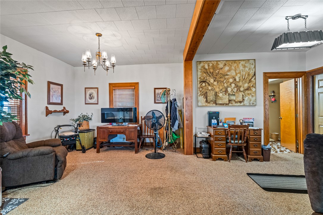 7404 Grubbs-Rex Road Arcanum, OH 45304 - Photo 5 of 40 This inviting living space features warm tones and ample room for daily living and productivity.