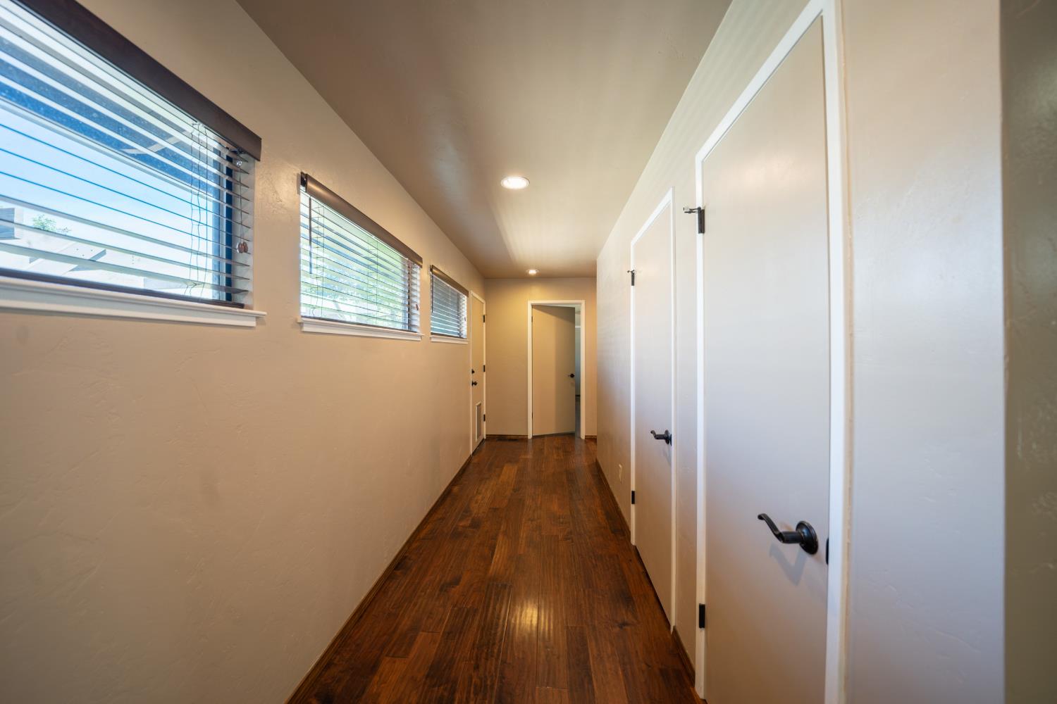 118 Main Street Murphys, CA 95247 - Photo 19 of 47 a view of a hallway with a wooden door