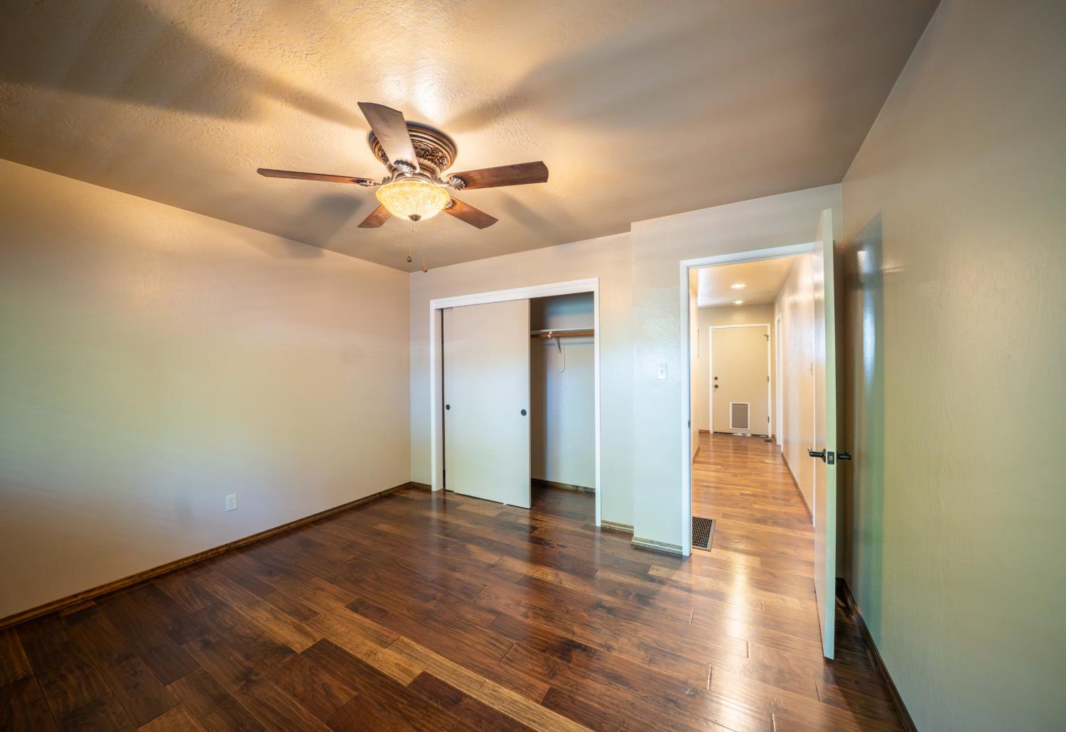 118 Main Street Murphys, CA 95247 - Photo 26 of 47 a view of an empty room and wooden floor