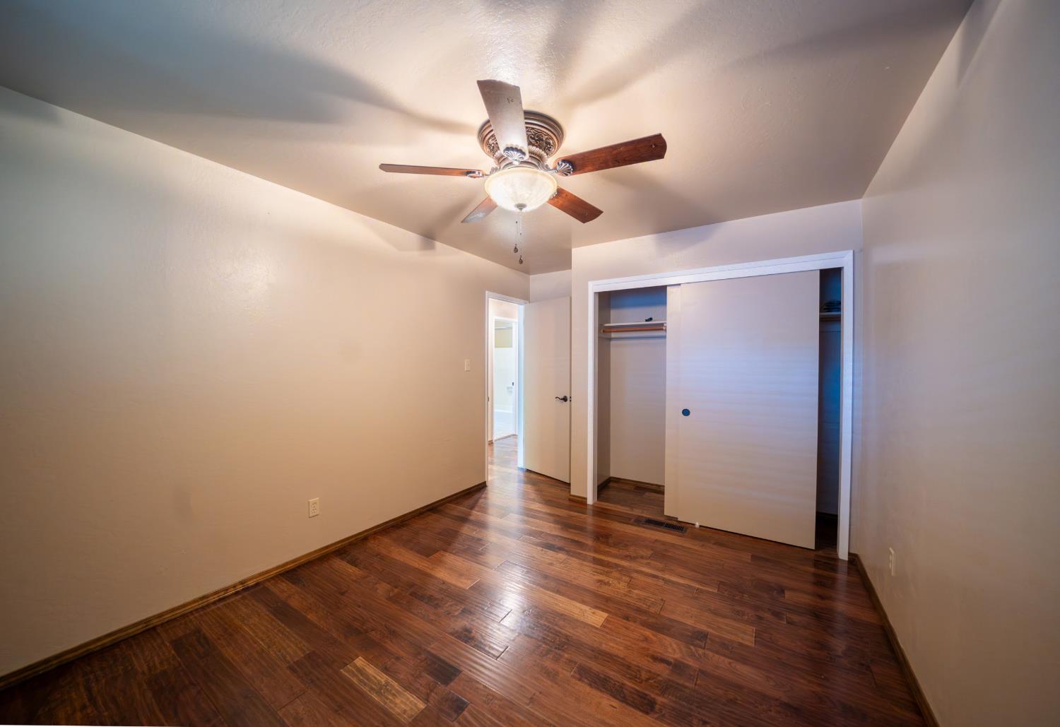 118 Main Street Murphys, CA 95247 - Photo 28 of 47 a view of an empty room with wooden floor