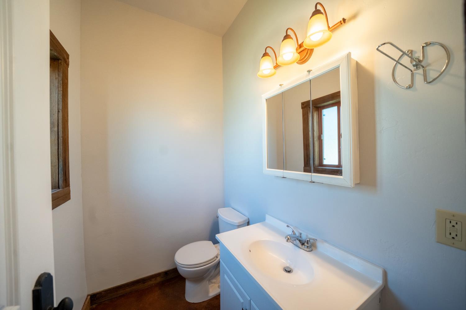 118 Main Street Murphys, CA 95247 - Photo 37 of 47 a bathroom with a sink mirror and toilet