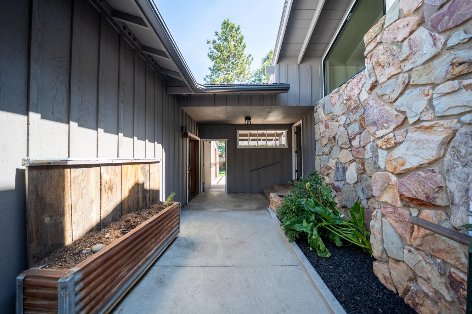 118 Main Street Murphys, CA 95247 - Photo 6 of 47 a view of an entryway with a garden