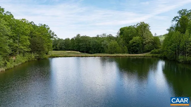 an aerial view of residential house with outdoor space