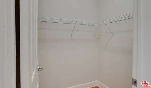 a view of a room with racks on the wall