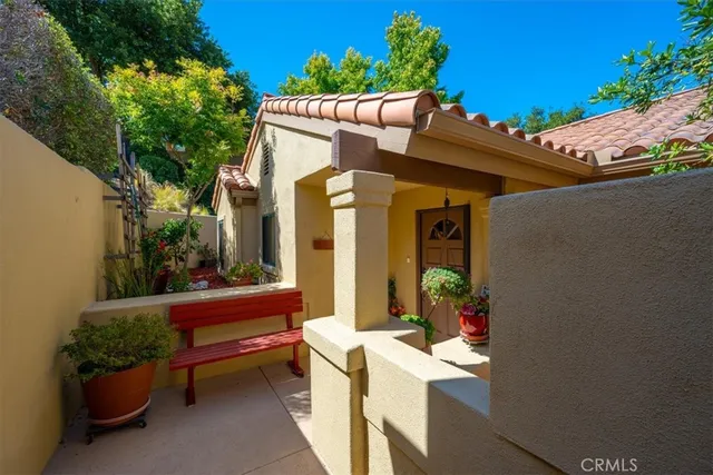 a view of a city street from a balcony