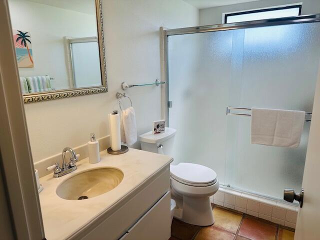 40511 Pebble Beach Circle Palm Desert, CA 92211 - Photo 14 of 26 a bathroom with a sink and a mirror