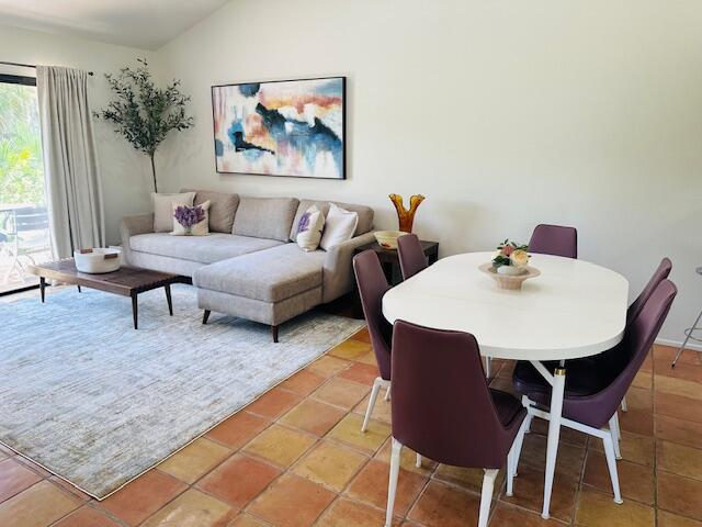 40511 Pebble Beach Circle Palm Desert, CA 92211 - Photo 7 of 26 a living room with furniture and a potted plant
