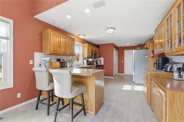 $409,000 | 1009 Southwest Blazing Star Drive, Lee's Summit, MO 64081