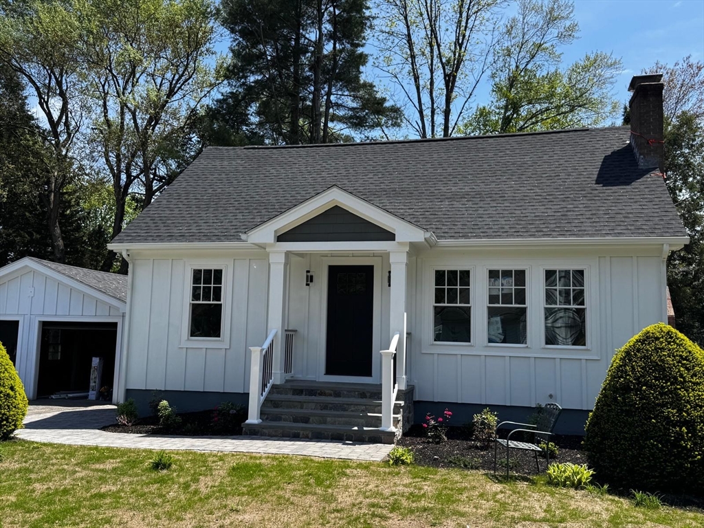 a view of house with yard outdoor seating and barbeque oven