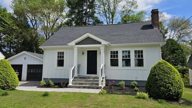 26 Eleanor Road Framingham, MA 01701 - Photo 2 of 15 a front view of a house with a yard