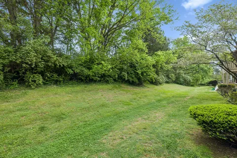 a view of an outdoor space and a yard