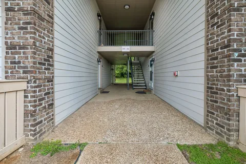 a view of outdoor space and porch with furniture