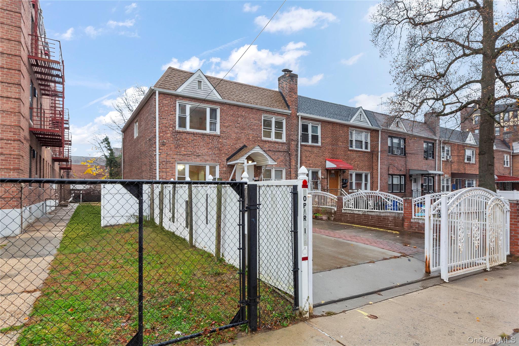 91-41 195th Street Queens, NY 11423 - Photo 2 of 31 a view of a house with wooden floor next to a yard