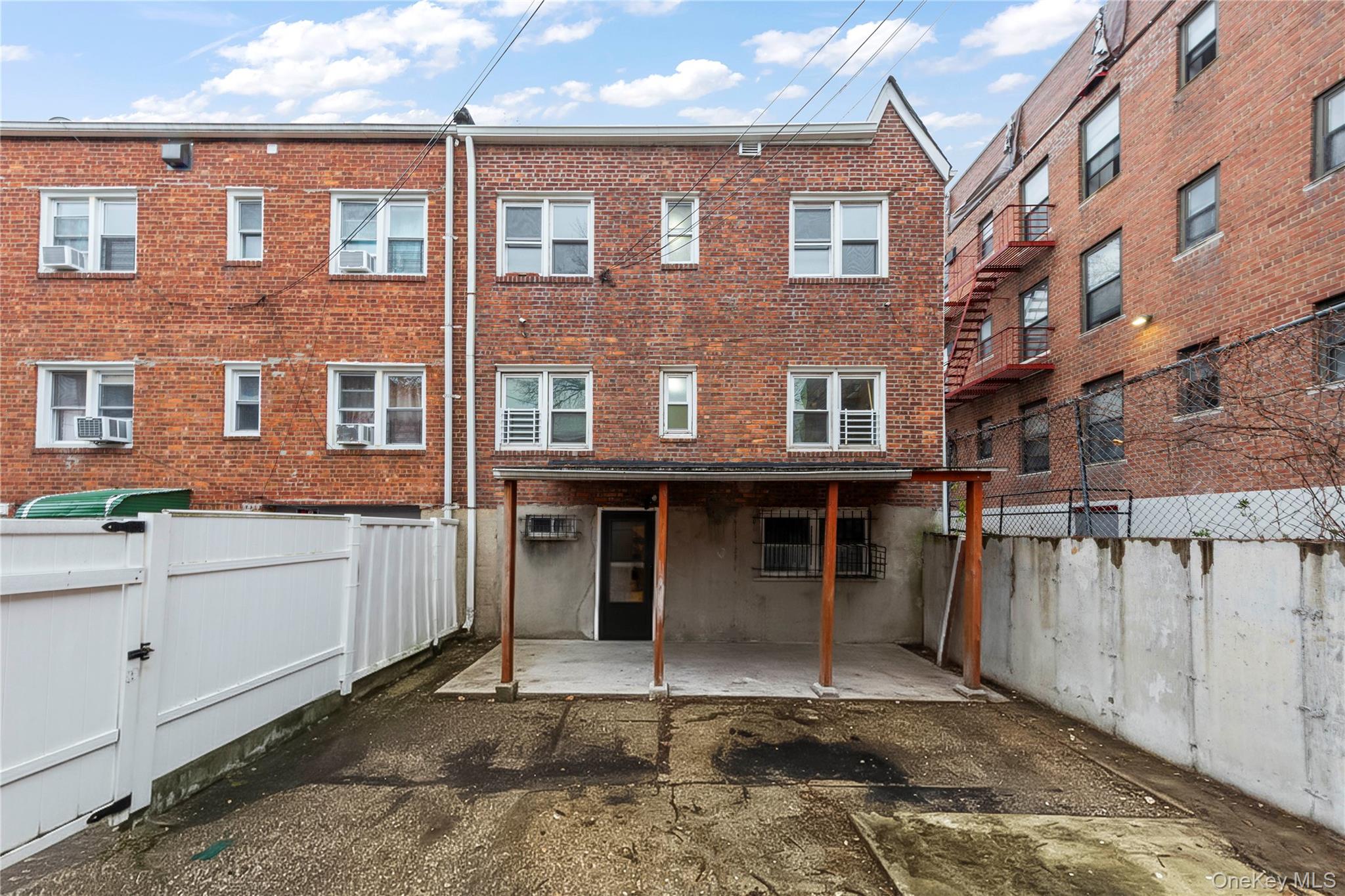 91-41 195th Street Queens, NY 11423 - Photo 27 of 31 a view of a brick building with many windows