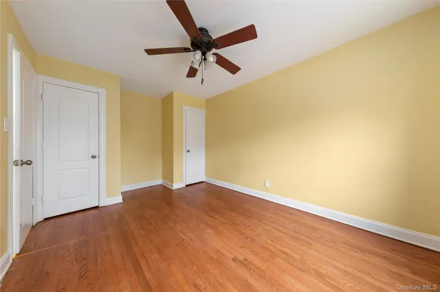 a view of a big room with wooden floor